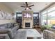 Cozy living room with a fireplace, built-in shelves, and hardwood floors at 1005 Vesper Ct, Durham, NC 27703