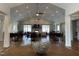 Large lounge area boasting a fireplace and abundant seating with chairs and tables at 1005 Vesper Ct, Durham, NC 27703