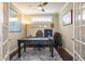 Inviting home office with custom touches, including a world map, modern desk, and ample natural light at 1005 Vesper Ct, Durham, NC 27703