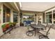 Charming covered patio with a dining area and comfortable seating for outdoor enjoyment at 1005 Vesper Ct, Durham, NC 27703
