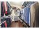 This walk-in closet features wire shelving and plenty of hanging space to store all of your personal belongings at 1005 Vesper Ct, Durham, NC 27703