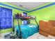 Bedroom with bunk bed, green walls, blue accents, and chair at 101 Elk River Ct. Ct, Mebane, NC 27302