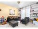 Cozy living room with decorative lighting, plush seating and built-in bookshelves at 101 Elk River Ct. Ct, Mebane, NC 27302