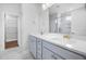 Bathroom featuring double vanity, modern fixtures, and a walk-in shower at 102 E Star Foal Ln, Wendell, NC 27591