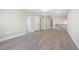 Upstairs bonus room featuring luxury vinyl flooring and natural light from multiple rooms at 102 E Star Foal Ln, Wendell, NC 27591