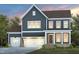 Charming two-story home with a three-car garage and gray siding in a beautiful suburban setting at 102 E Star Foal Ln, Wendell, NC 27591