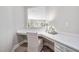 Bright home office features a modern built-in desk with quartz countertops and stylish decor at 102 E Star Foal Ln, Wendell, NC 27591