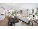 Spacious open-concept living area that joins kitchen, dining and living spaces at 102 E Star Foal Ln, Wendell, NC 27591