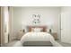 Bright bedroom with a cozy bed, stylish lamps, and a serene atmosphere at 103 Ellsworth Ct # 175, Garner, NC 27529