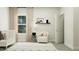 Comfortable Bedroom nook features a swivel chair, crib, and soft lighting at 103 Ellsworth Ct # 175, Garner, NC 27529