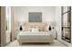 Calm bedroom showcases a modern bed, soft lighting, and sleek decor at 103 Ellsworth Ct # 175, Garner, NC 27529