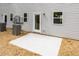 Backyard patio with light gray siding and two A/C units at 1047 |1049 E Harnett St, Dunn, NC 28334