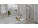 Bathroom features a soaking tub next to the walk in shower at 105 Jasper Creek Ct, Wilson's Mills, NC 27520