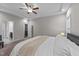 Spacious bedroom boasts a tray ceiling and a connecting door to the bathroom at 105 Jasper Creek Ct, Wilson's Mills, NC 27520