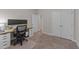 Office space with neutral colored walls and a double door closet at 105 Jasper Creek Ct, Wilson's Mills, NC 27520