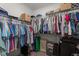 Large walk-in closet with extensive shelving and ample storage space at 105 Jasper Creek Ct, Wilson's Mills, NC 27520