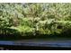 The back deck looks out on a tree-filled private area at 108 W Savannah Ridge Rd, Holly Springs, NC 27540
