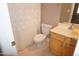 Cozy bathroom with patterned shower curtain, toilet, and single sink vanity at 108 W Savannah Ridge Rd, Holly Springs, NC 27540