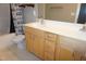 Double vanity bathroom with wood cabinets, toilet, and shower-tub combination at 108 W Savannah Ridge Rd, Holly Springs, NC 27540