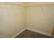 Walk-in closet with shelving and carpeted floor at 108 W Savannah Ridge Rd, Holly Springs, NC 27540