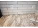 Close-up of granite countertop featuring subway tile backsplash and conveniently placed electrical outlets at 108 W Savannah Ridge Rd, Holly Springs, NC 27540