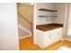 Dining area features hardwood floors, built-in cabinets with wood countertop, and ample storage at 108 W Savannah Ridge Rd, Holly Springs, NC 27540