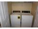 Laundry area with a washer and dryer at 108 W Savannah Ridge Rd, Holly Springs, NC 27540