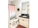 Bathroom with a shower/tub combo and a granite vanity at 1129 Kudzu St, Durham, NC 27713