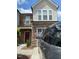 Inviting two-story home featuring stone accents, a driveway, and a well-maintained facade at 1129 Kudzu St, Durham, NC 27713