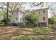 Exterior view of home and grassy backyard at 1208 College Pl, Raleigh, NC 27605