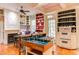 Large kitchen with a central island, custom cabinets, fireplace, and an open floor plan at 1208 College Pl, Raleigh, NC 27605