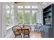 Charming sunroom with natural light and views of the outdoors at 1208 College Pl, Raleigh, NC 27605