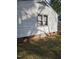 View of the back of a home with siding and brick at 1210 Cypress St, Rocky Mount, NC 27801