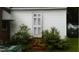 Shows the exterior with foliage surrounding the walls at 1210 Cypress St, Rocky Mount, NC 27801