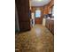 Classic kitchen with wooden cabinets, parquet flooring, and a window with a blind at 1210 Cypress St, Rocky Mount, NC 27801