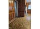 Traditional kitchen featuring wood cabinetry, a vintage-look floor, and classic appliances at 1210 Cypress St, Rocky Mount, NC 27801
