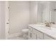 Clean, well-lit bathroom with white marble floors, white cabinets, and a shower at 1217 Linkwood Way, Fuquay Varina, NC 27526
