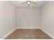Spacious room with hardwood floors, ceiling fan, neutral walls, and white trim at 1217 Linkwood Way, Fuquay Varina, NC 27526