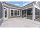 Outdoor patio with a screened in porch, neutral exterior, and string lights at 1217 Linkwood Way, Fuquay Varina, NC 27526