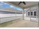 Screened porch with ceiling fan and view of the backyard at 1217 Linkwood Way, Fuquay Varina, NC 27526