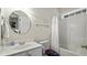 Clean bathroom with a shower-tub combo, vanity, and neutral color scheme at 1505 Starmont Dr, Hillsborough, NC 27278
