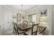 Elegant dining room with a large table, chandelier, and neutral decor, perfect for gatherings at 1505 Starmont Dr, Hillsborough, NC 27278