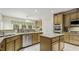 Well-equipped kitchen featuring stainless steel appliances, granite countertops, and center island at 1505 Starmont Dr, Hillsborough, NC 27278