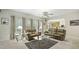 Comfortable living room features abundant natural light, plush seating, and views into the kitchen at 1505 Starmont Dr, Hillsborough, NC 27278