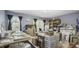 Art studio space with natural light, work tables, and ample storage for creative projects at 1505 Starmont Dr, Hillsborough, NC 27278