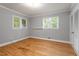 Light and airy bedroom with hardwood floors and natural light at 1615 Malta Ave, Raleigh, NC 27610