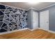 Geometric pattern wall design within a bedroom at 1615 Malta Ave, Raleigh, NC 27610