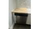 Stainless steel dishwasher featuring a butcher block top in a modern kitchen at 1615 Malta Ave, Raleigh, NC 27610