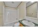 Compact bathroom features a shower-tub combo and single sink at 162 E Abbey Ct, Smithfield, NC 27577