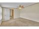 Bedroom featuring carpeted floors, a ceiling fan, and an attached bathroom at 162 E Abbey Ct, Smithfield, NC 27577